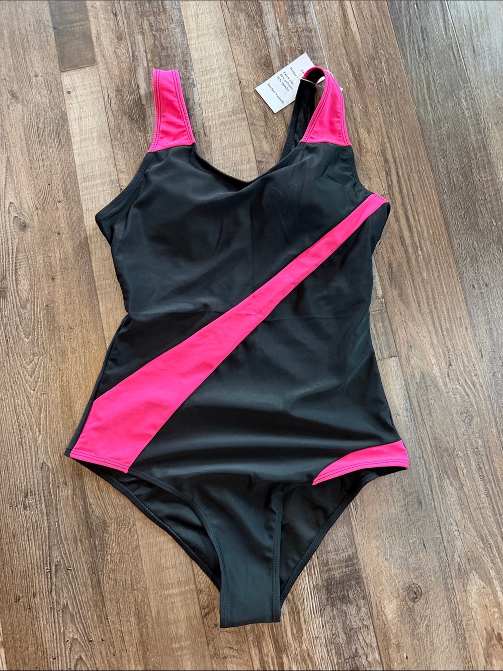 Black One-Piece Swimsuit with Pink Diagonal Accent